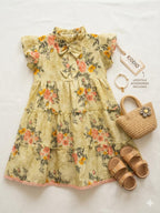 Floral dress with accessories on a white background